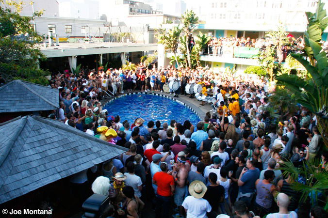 A crowd of people around the pool at Phoenix Hotel for Juanita MORE!'s Pride party in 2009.