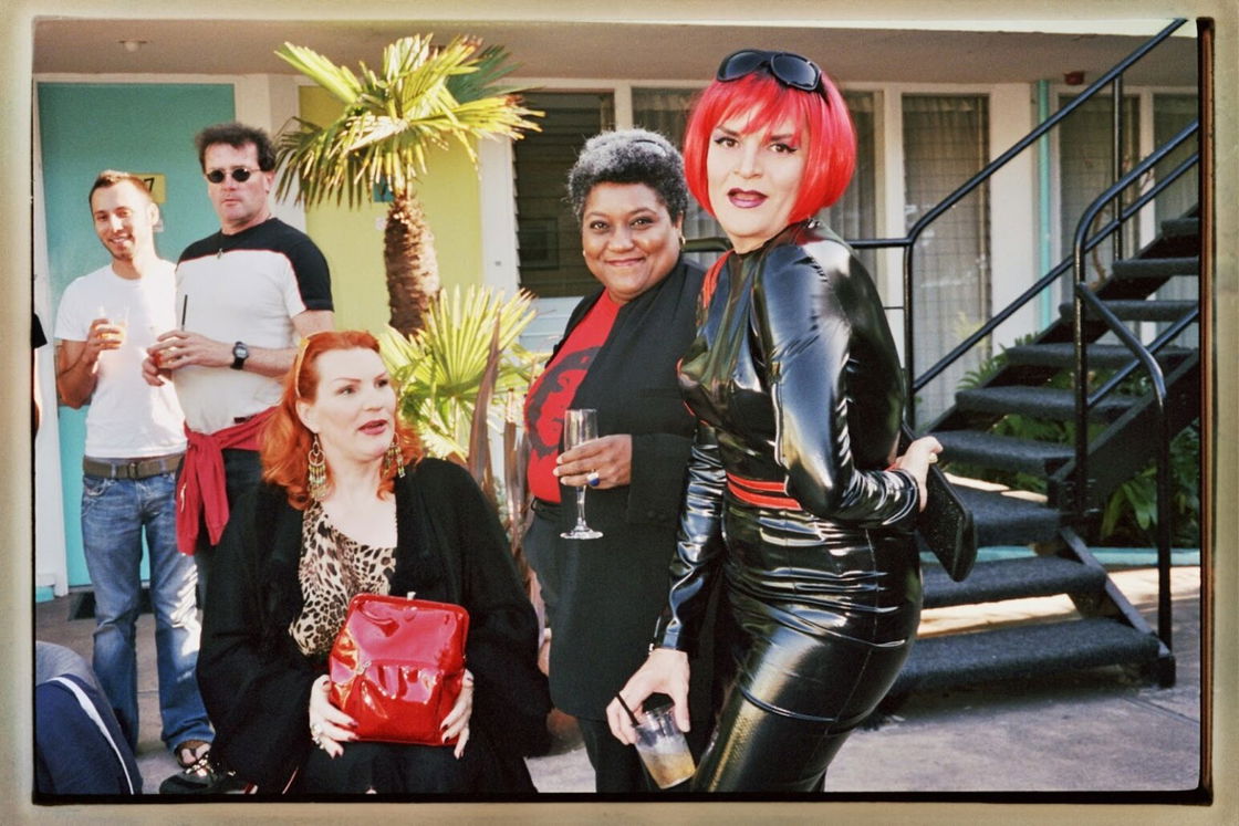 Veronica Klaus, Tammy Hall & Glamamore stand next to each other at a party at Phoenix Hotel for Juanita MORE!'s birthday. 